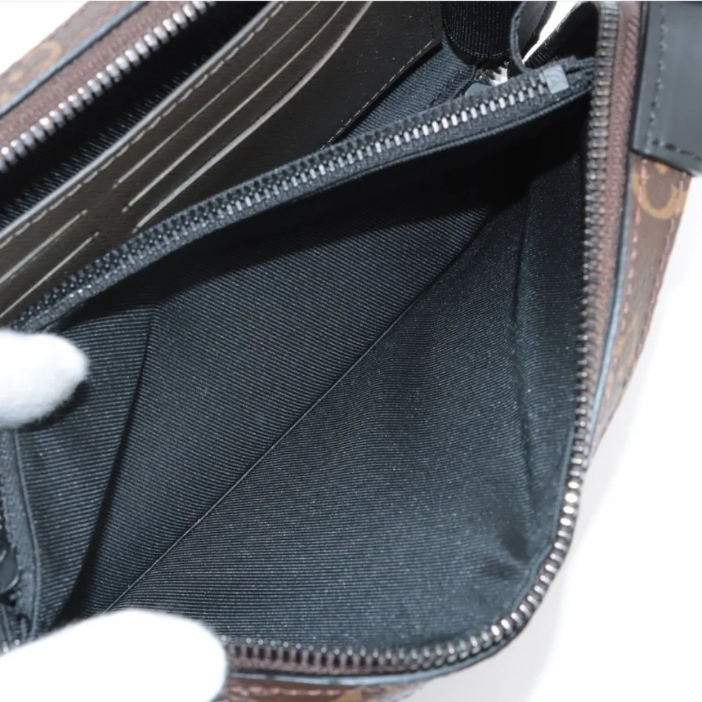 Authentic Louis Vuitton Monogram Taiga Soft Trunk Wallet - Picture 6 of 11